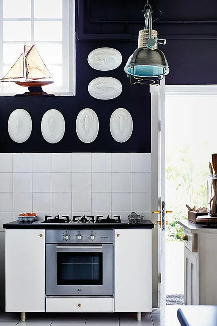 No sleek kitchen built-ins here! The family cooks on this stand-alone stove.