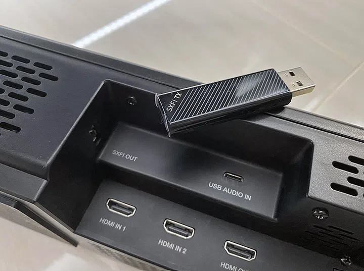 The SXFI Carrier comes with a good number of ports, including an SXFI out port, but they can be difficult to reach. Best to get the cabling right during setup and have it out of sigh and out of mind.