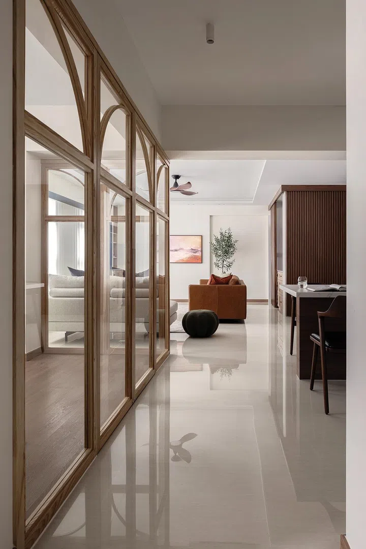 Converting a bedroom into a study and installing glass doors bring more natural light into the dining area.