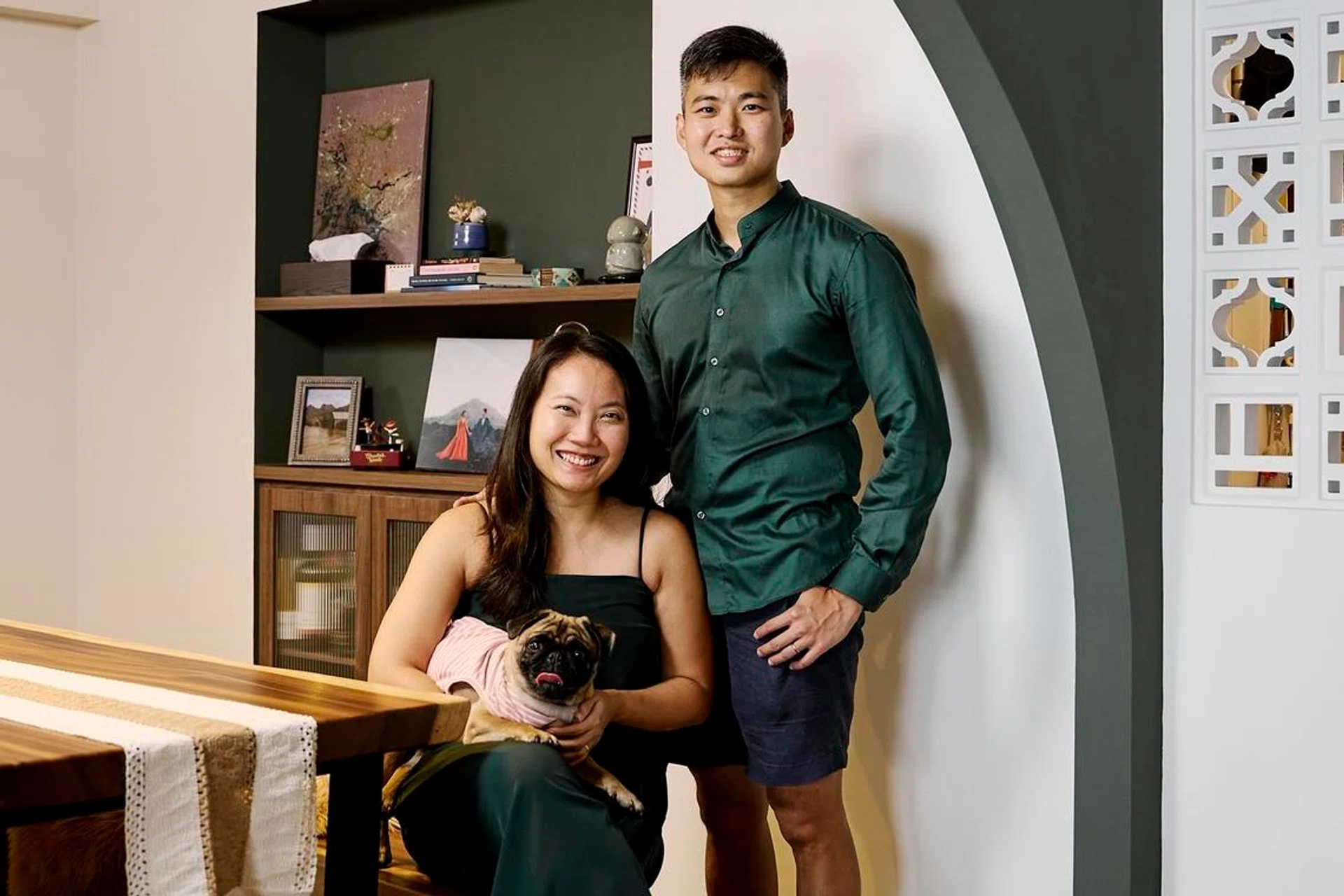 A Singaporean teacher and aviation firefighter couple in their early 30s, and their two pugs, Brie and Chip lives in this 5-room BTO (1,216 sq ft), interiors designed by Etherall.