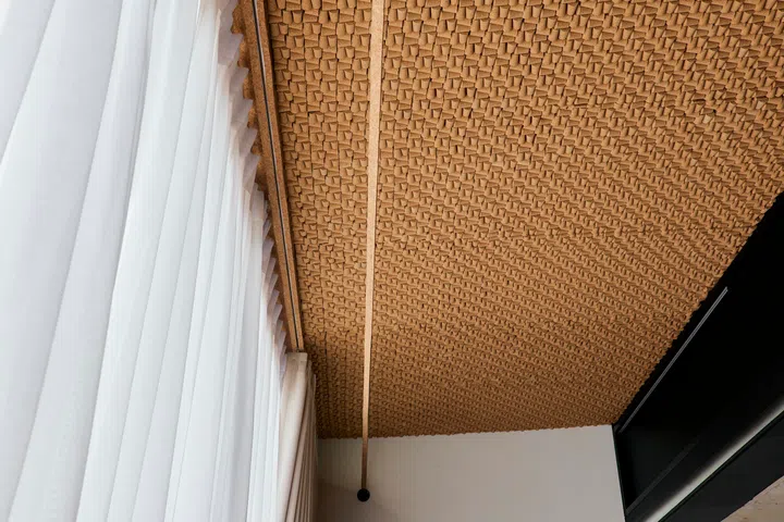 A 2-by-6 metre section of ceiling is lined with 12,500 wine corks, individually placed and glued by the homeowner into custom-built trays.
