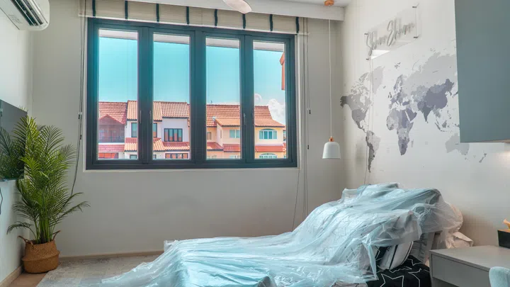 After: with window film applied, glare is reduced and the space remains bright, but noticeably more comfortable.