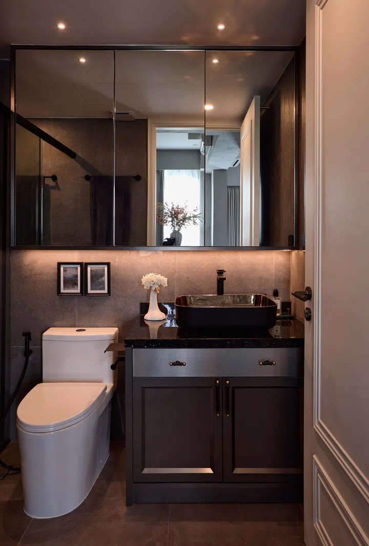 The master bathroom exudes luxury with its elegant fixtures and refined finishes.