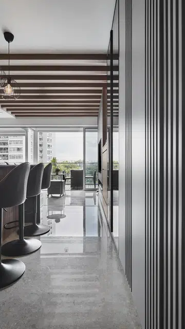 Dining room within a 3 plus 1 bedroom apartment in Waterfront Key condominium along Bedok Reservoir Road.