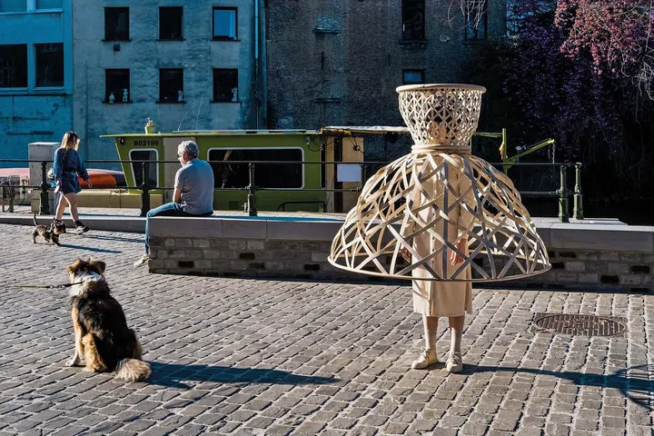 It is to be worn over the head and body to raise awareness for the need for social distancing.