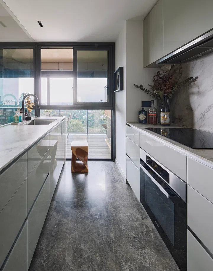 Considered details in the kitchen reflect a design ethos rooted in simplicity and refinement.