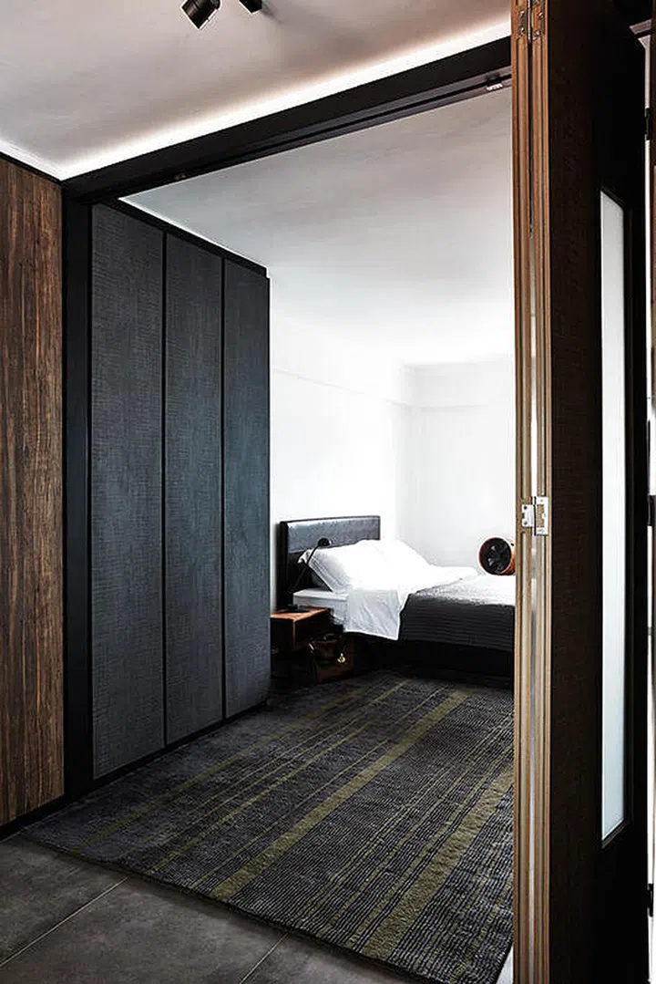 The wall between both bathrooms was removed to create a private space that's double in size. (Reno: $47,000)