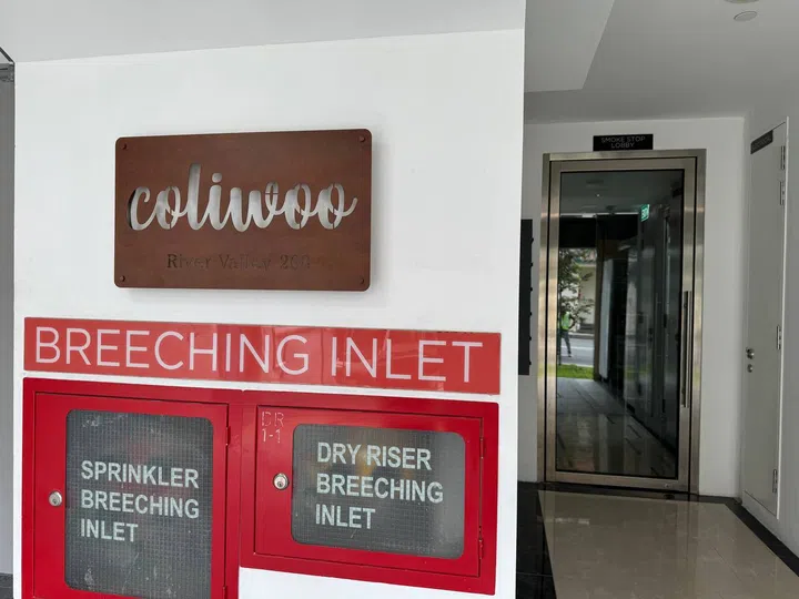 Entrance to Coliwoo River Valley 268, with a lift lobby on the side.