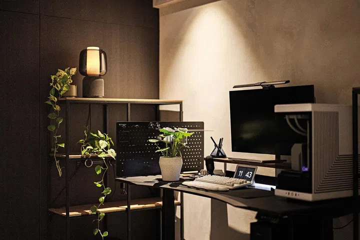 Homeowner's study table was positioned right next to his bed in the master bedroom in his 3-room HDB flat in Ang Mo Kio.