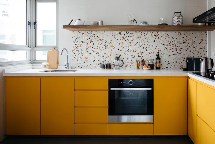 The homeowner’s favourite terrazzo makes another appearance in the kitchen as the backsplash.