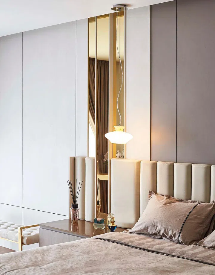 Elegant champagne and gold luxurious master bedroom design for the homeowners in this 4-storey terrace house in Telok Kurau.