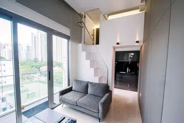 Living room in a family of 3's 840 sq ft mini condominium in River Valley, designed by interior designer Kelvin Bing.