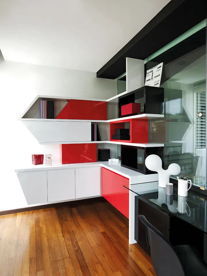 Modernist lines and a striking palette turn the study into a dramatic working space. (Reno: $180K, excluding furnishings). Interior design by Space Sense