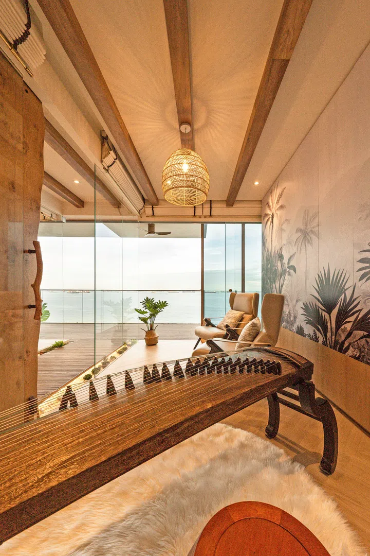 Opposite the master bedroom is the music and guest room featuring a Guzheng.