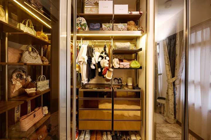 Open storage puts clothes, accessories and favourite pieces within easy reach.