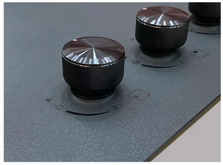 Glass knobs on Life by City Energy's gas stove hobs.