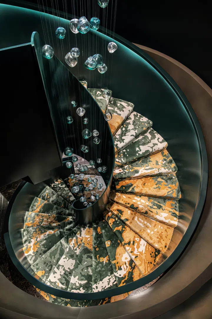 Spiral staircase in the BAIC Tower, designed by Hirsch Bedner Associates (HBA).