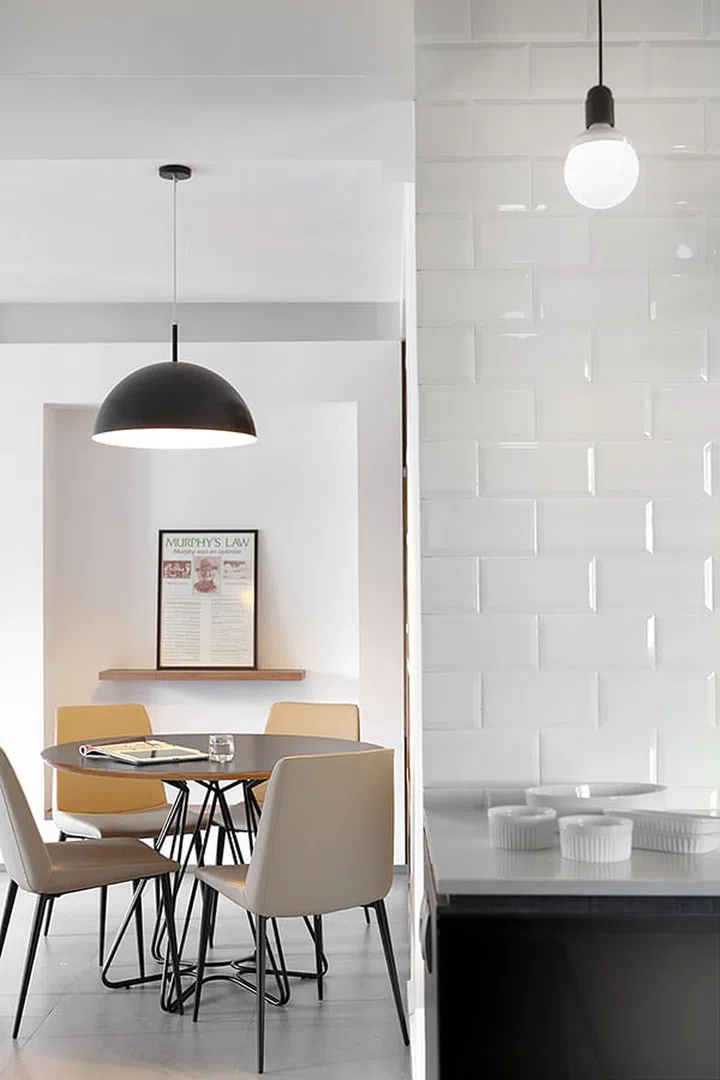 A twist of modern, industrial and scandinavian interior design styles in this dining room. Interior design by The Scientist