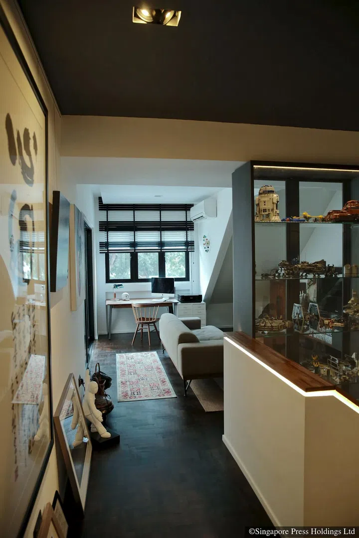 A calligraphy piece by Lim Tze Peng hangs on a wall of adman Jeff Cheong's three-storey house in Telok Kurau Road.
