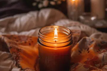 Aromatic Candle Burning on the Bed Generative AI