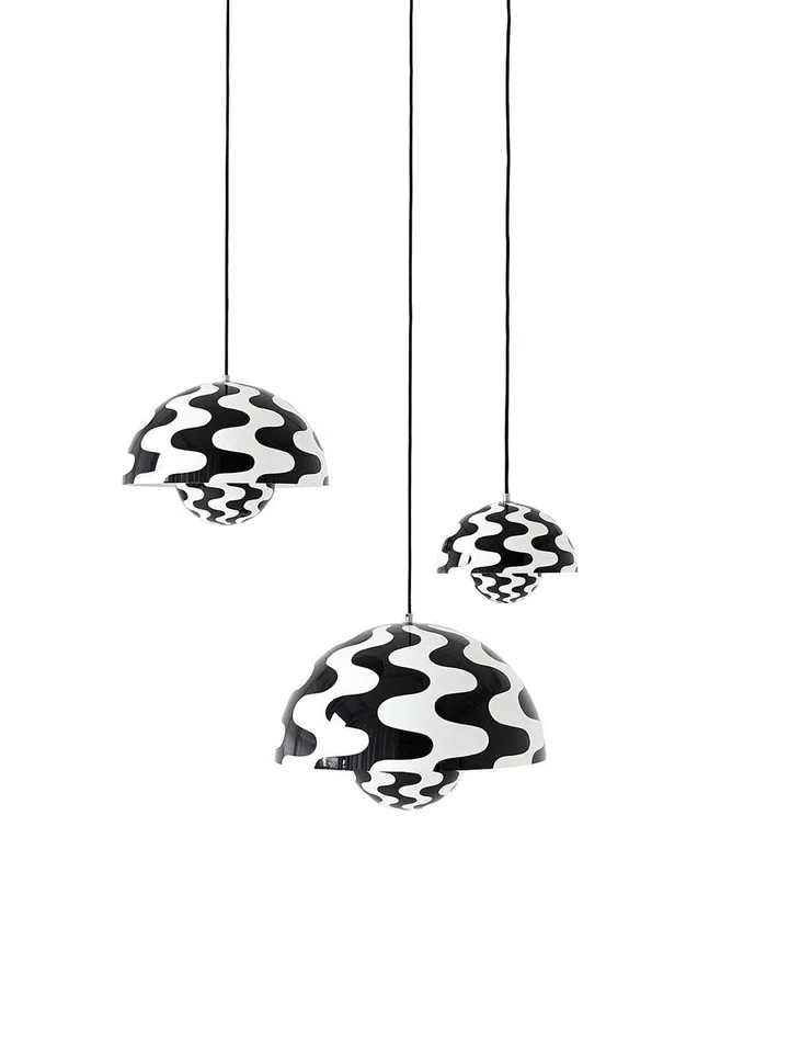 Carin Panton's Flowerpot pendant lamp in black and white wave pattern.