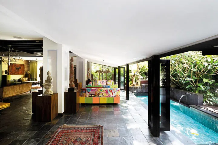 Tall plants and trees provide lush landscaping and privacy.