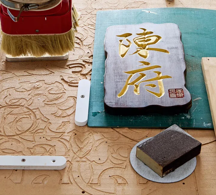 Selecting the right fonts for each sign becomes an art form for Kai.