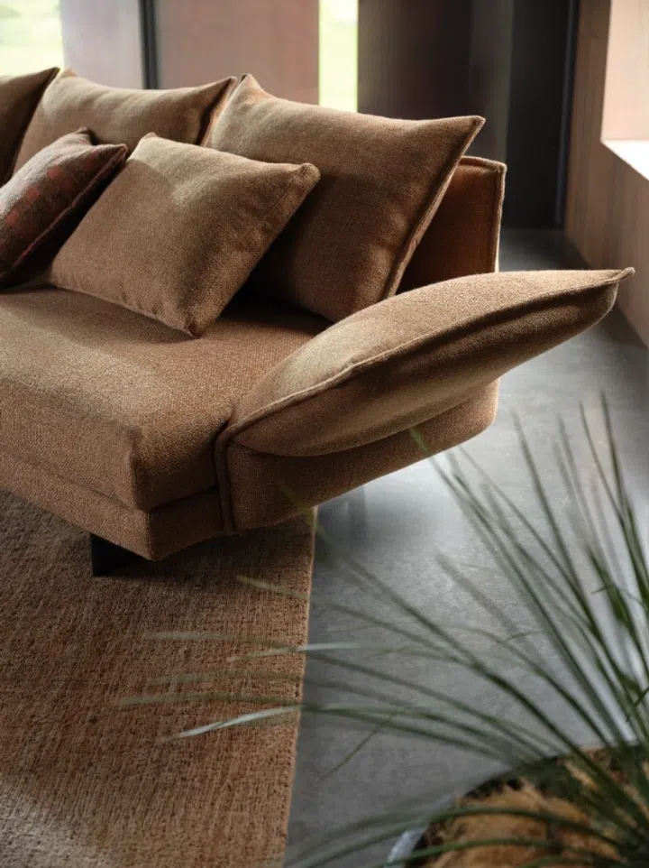 Natural light brings out the layered appearance of Baxter, a chenille fabric woven with contrasting colours in the warp.