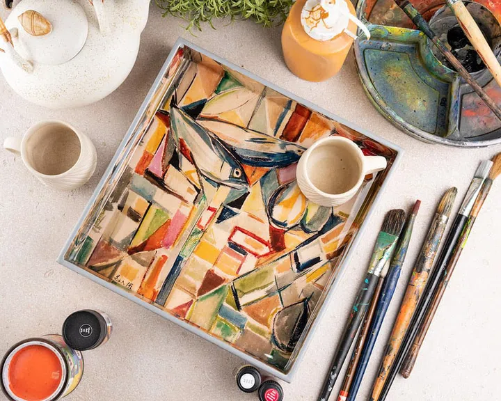 A tray with his artwork, Still Life. 