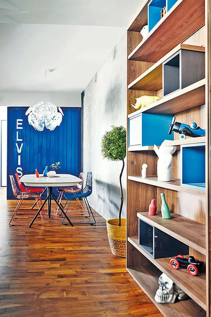 The Bend wire chairs and a cyan shipping-container bomb shelter-cum- storeroom are some features that stand out in this industrial- influenced home.