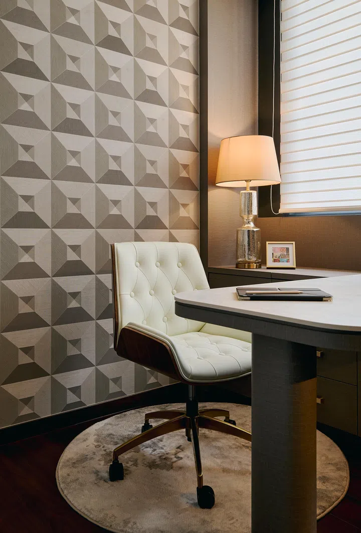 The study’s warm palette and Oriental-inspired details balance elegance with practical function.