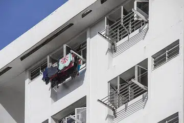 The new laundry rack comes with six horizontal stainless steel poles that can be extended and retracted within the frame of the rack. Residents would no longer need to manoeuvre heavy bamboo poles out of the kitchen window.PHOTO: HDB