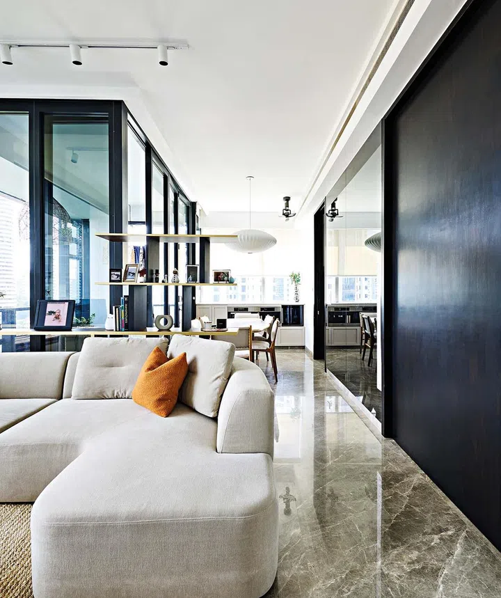 A Hay pendant lamp in the dining room grounds the space and injects an element of luxe.
