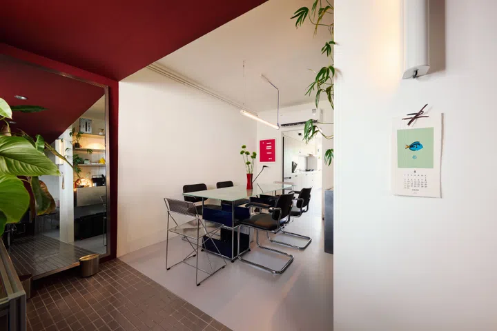 The dining room doubles as a workspace for Weilun and his partner.