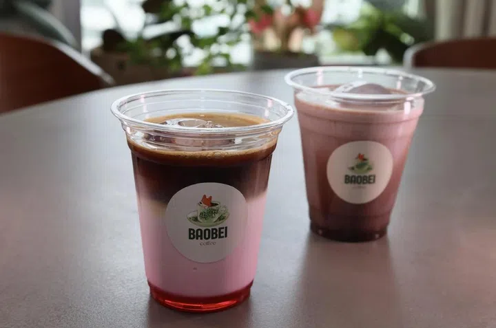 (From left) Bed of Roses (iced rose latte) and Cocoa Hugs (iced mocha) at home cafe Baobei Coffee.