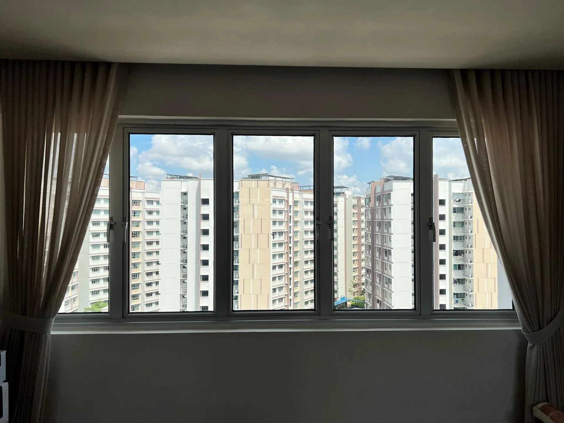 Large HDB windows bring in abundant daylight—but also shape how heat, glare, and comfort are experienced at home
