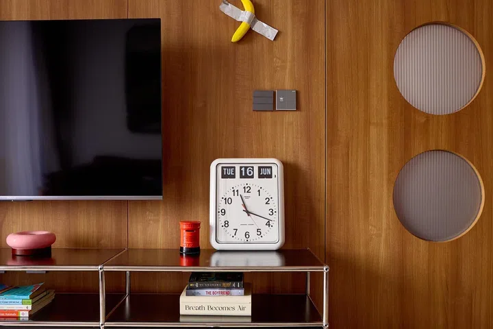 Travel souvenirs, childhood-inspired collectibles and playful artwork reflect the couple’s personalities.