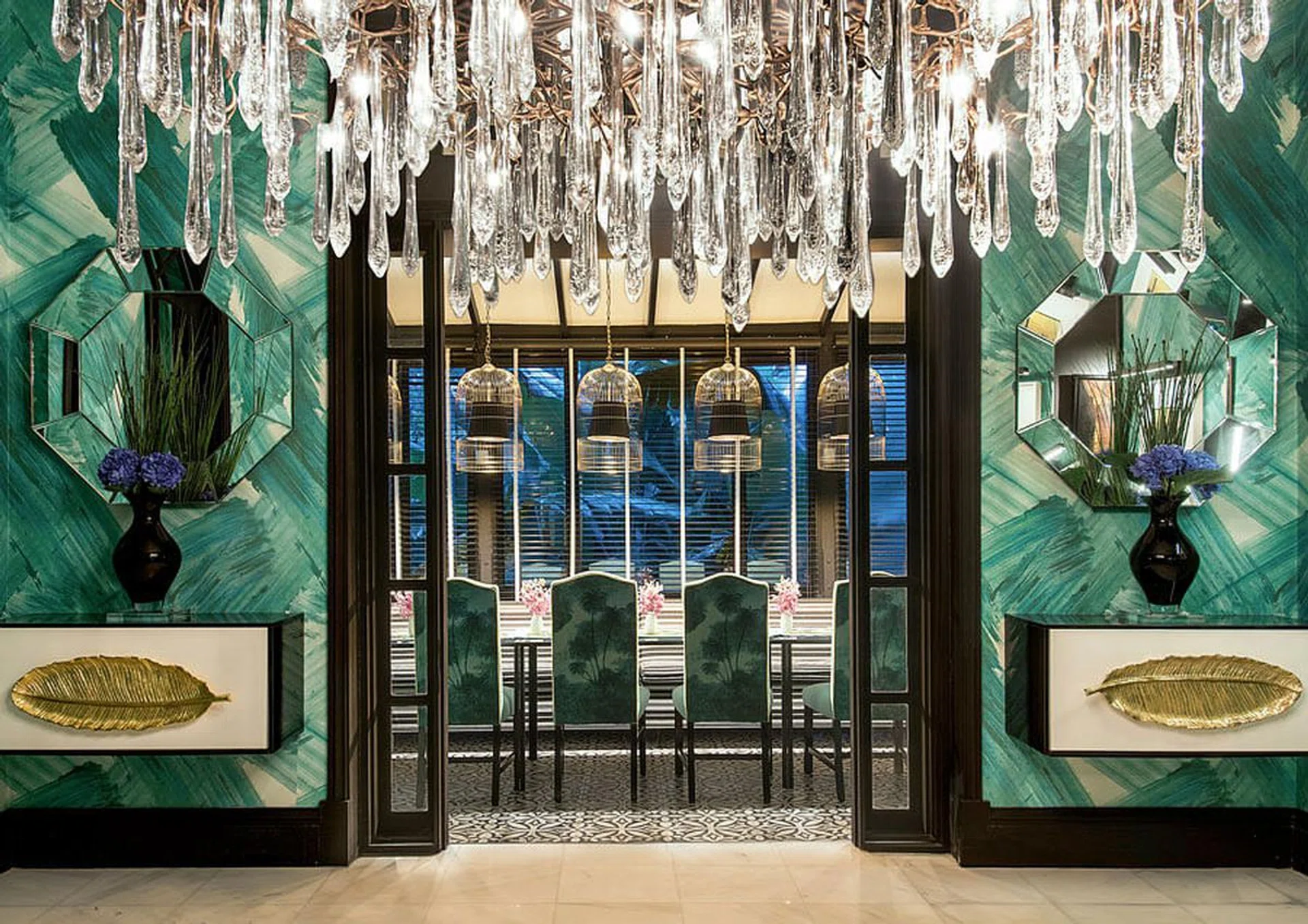 A pleasing symmetry in a dining room by Design Intervention. 