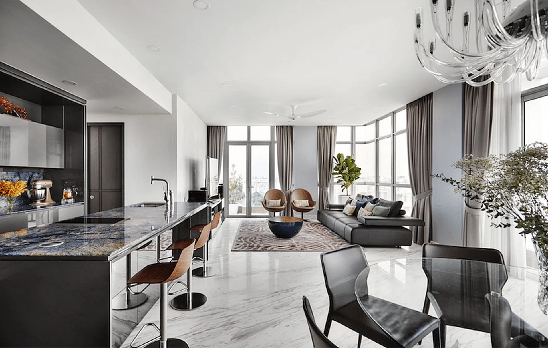 A contrast between white and darker hues gives definition to the living and dining areas.