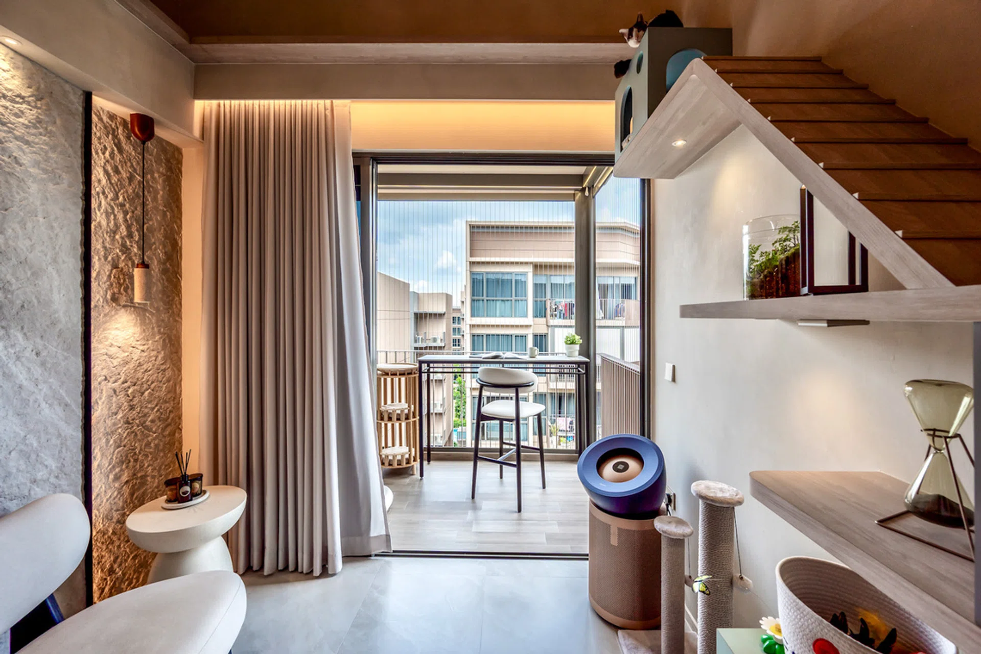 The home's vertical design seamlessly integrates feline pathways without compromising its warm, resort-inspired aesthetic.
