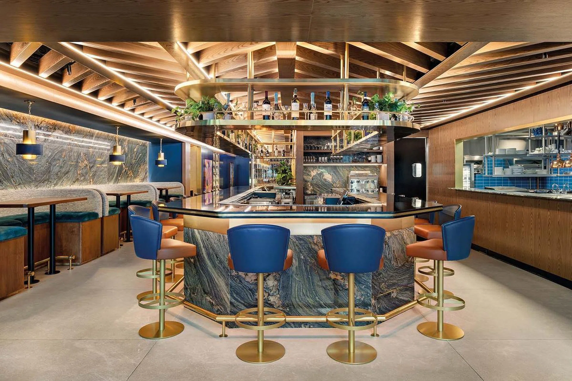 With a view to the open kitchen, the bar is the heart and soul of the restaurant. (RAFAEL GAMO)