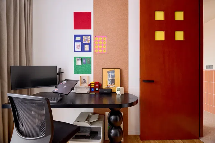 Floor-to-ceiling storage keeps the compact study clutter-free, while loose furniture allows the room to adapt as the family’s needs change over time.