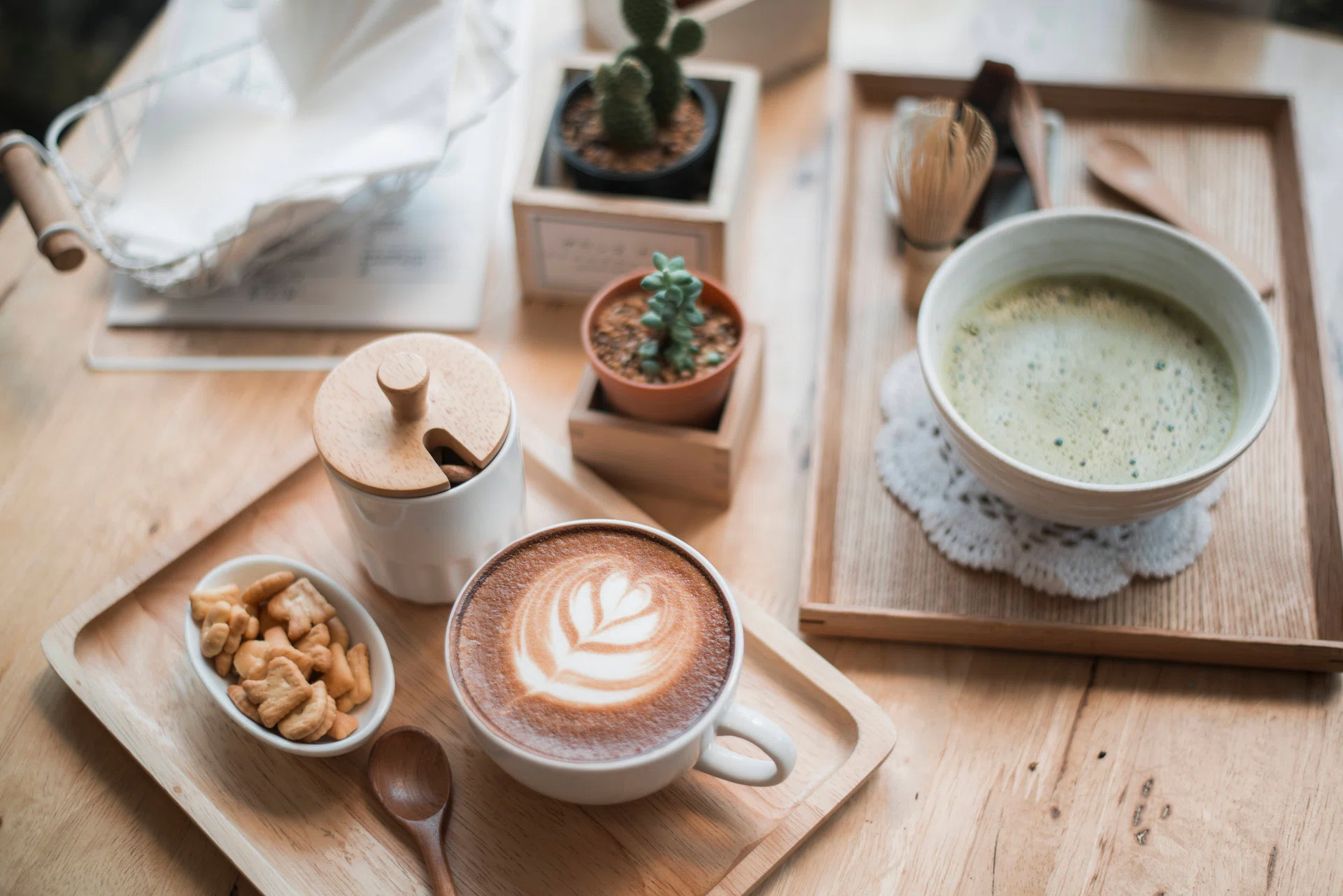 Cup of coffee latte art in coffee shop on thailand Japanese hipster Style