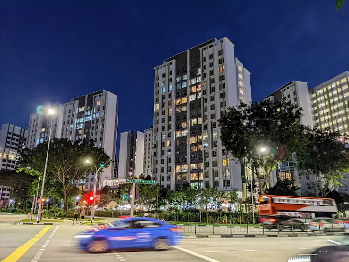 Night street view of the Alkaff Vista HDB estate from Upper Serangoon Road.