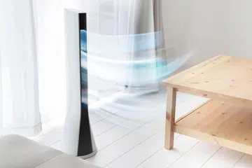 Tower fan with breeze in the living room