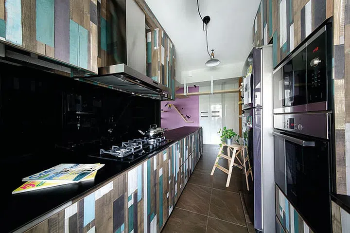 Kitchen cabinets sport patchwork-style laminates.