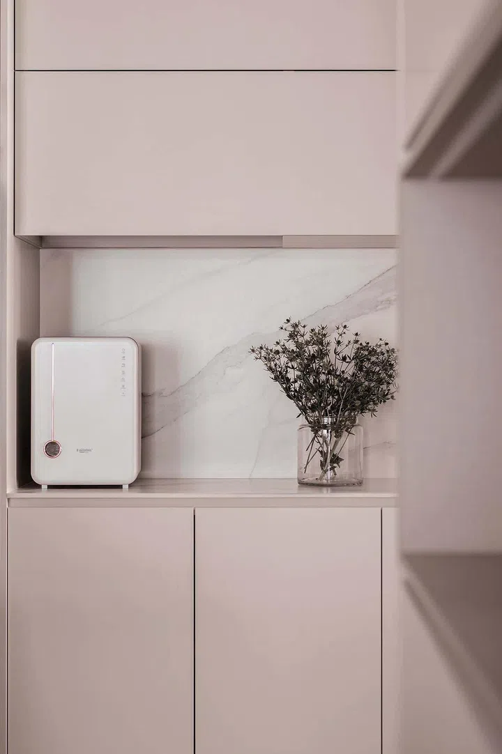 The colour palette comprises mainly neutral and muted shades, such as whites, creams, light greys and browns.