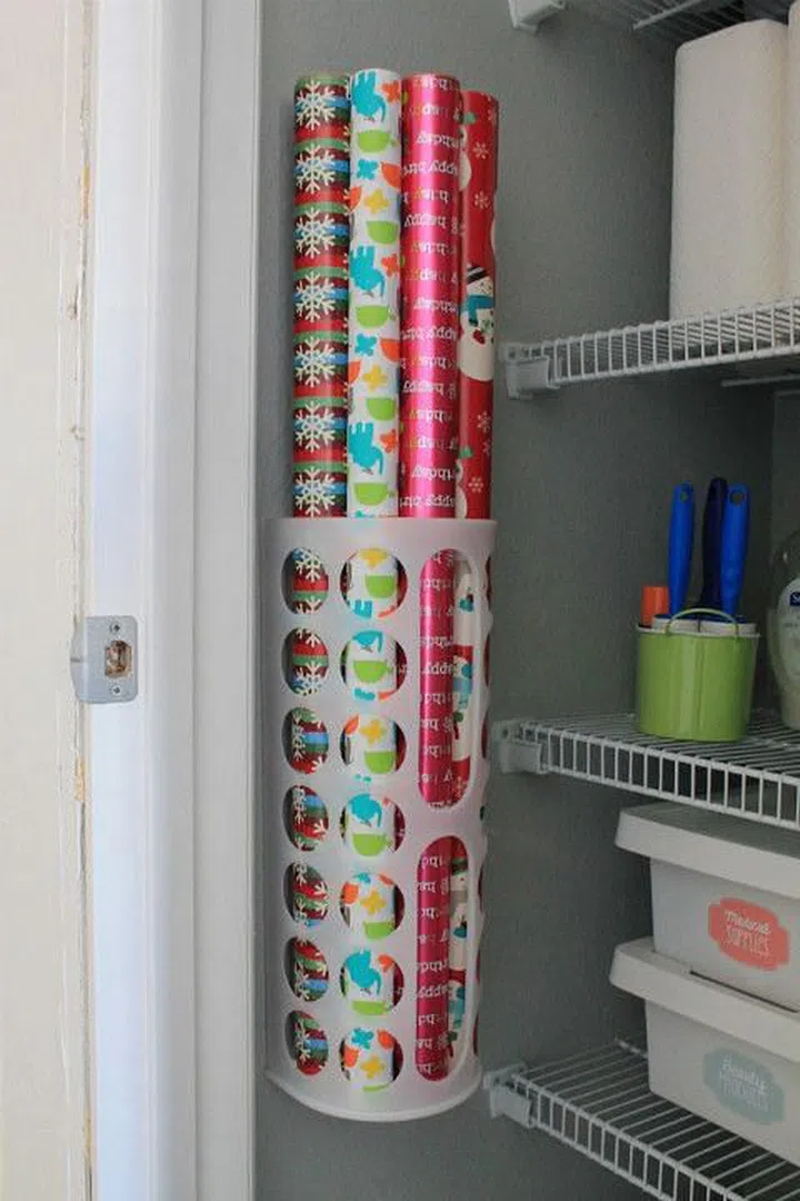 Store wrapping paper in IKEA Variera plastic bag dispensers