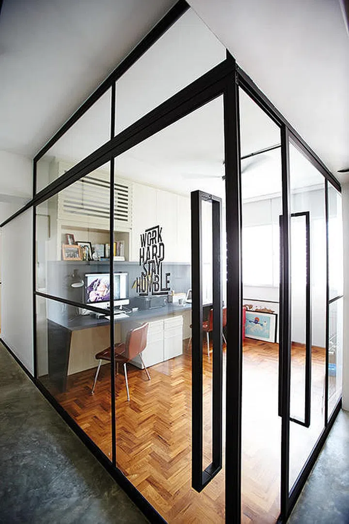 To let more light into your home, replace the walls with glass. This will help your home appear larger. Interior design by Produce