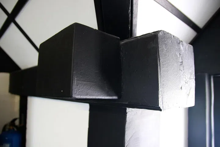 The striking frames support the stone-filled walls. Some frames had to be replaced because of termites, but the Urban Redevelopment Authority saved whatever it could during restoration works.